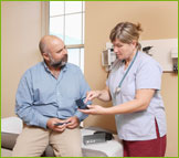 Man speaking with health professional