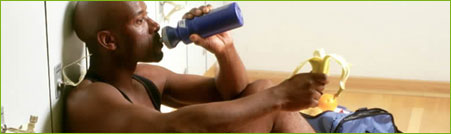 Man eating banana in the gym